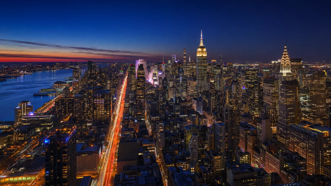 NYC skyline at night with Telltale Tours speakeasy and bar experiences